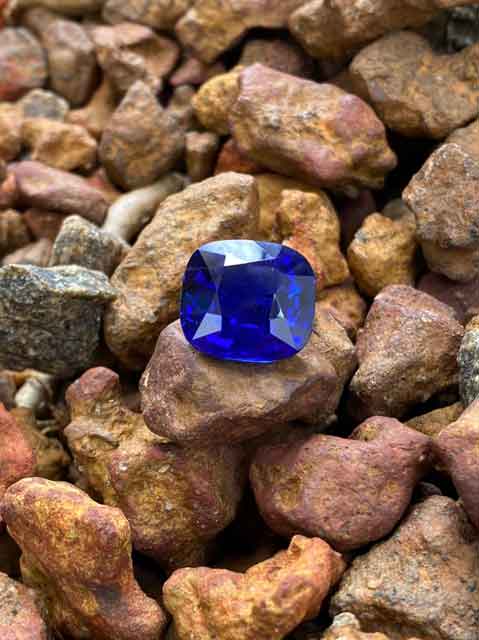 Blue gem on rocks