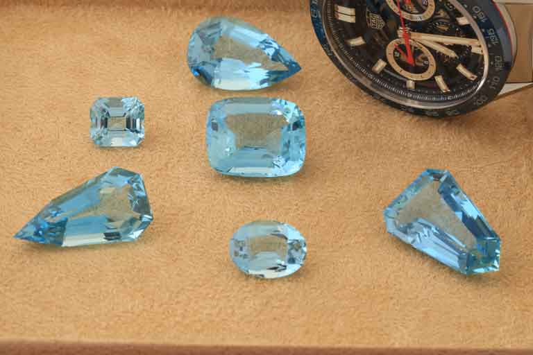 turquoise colored gems with s wrist watch